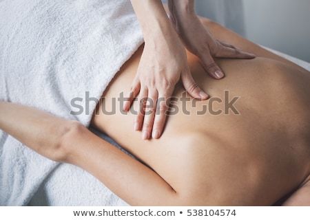 young-woman-relaxing-hand-massage-450w-538104574.jpg